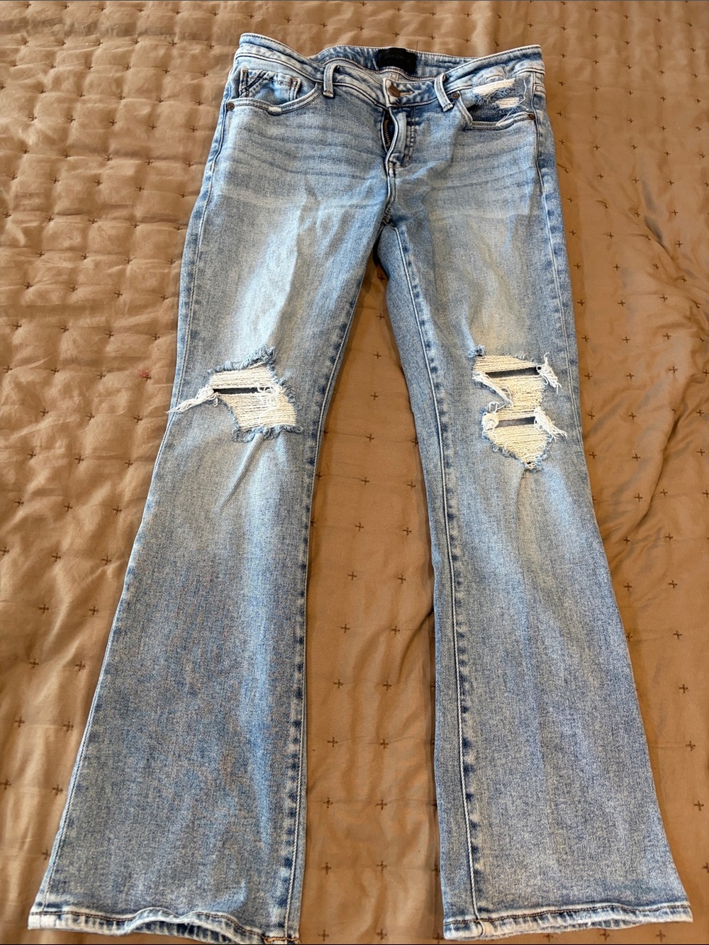 Buckle Light Blue Distressed Flare Jeans